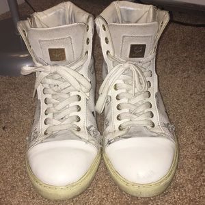 White MCM High top sneakers w/ gold zipper.